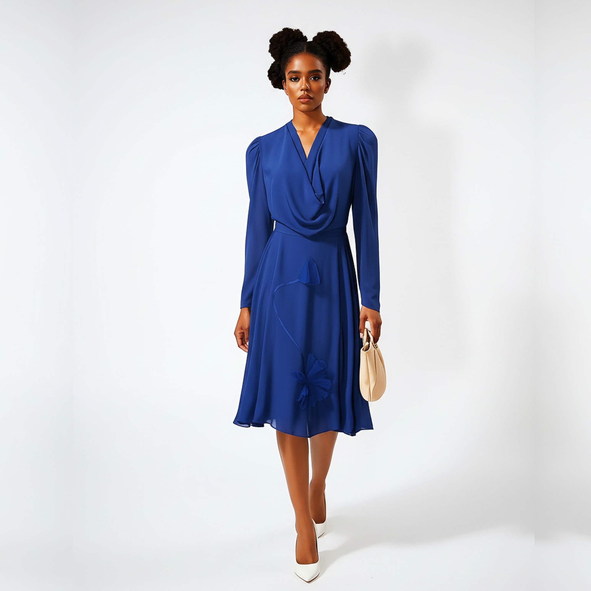 Woman wearing a blue dress against a white background