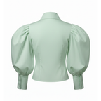 Light green blouse with puffed sleeves on a white background