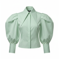 Light green blouse with puffed sleeves on a white background