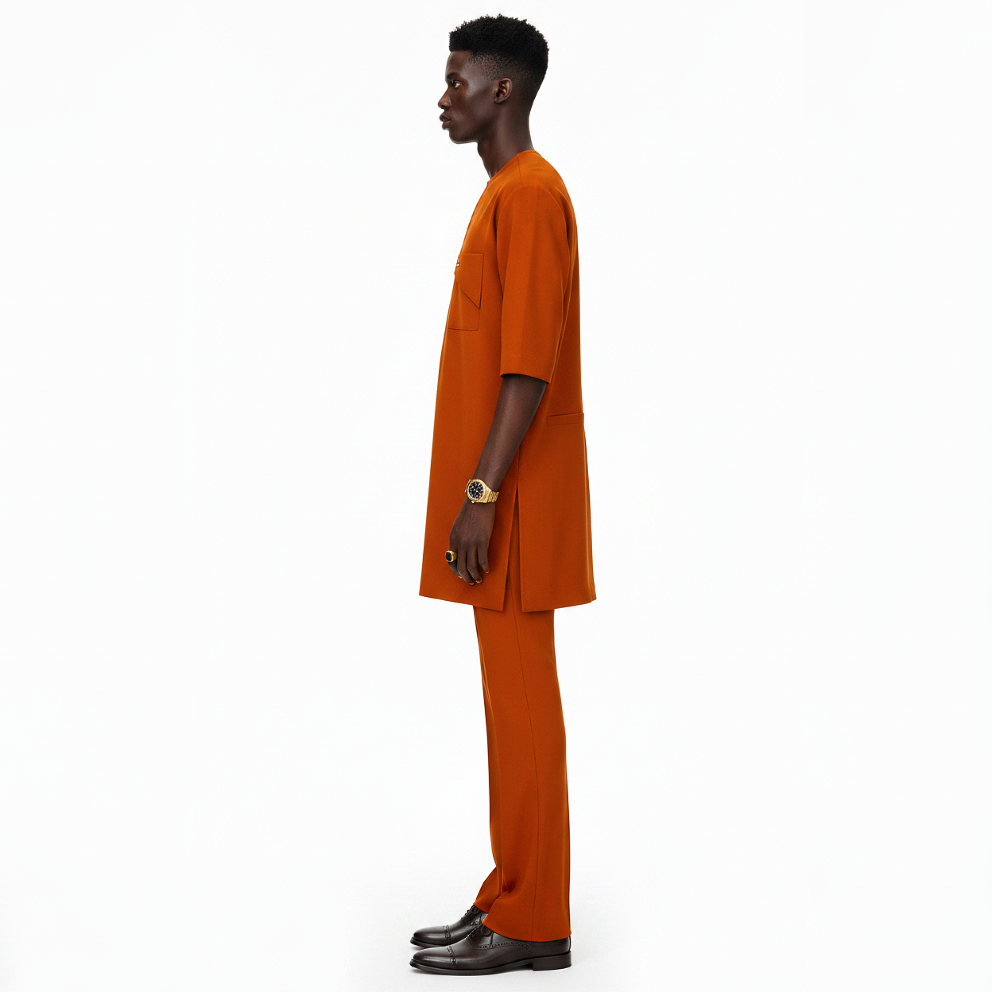 Man wearing an orange outfit on a white background