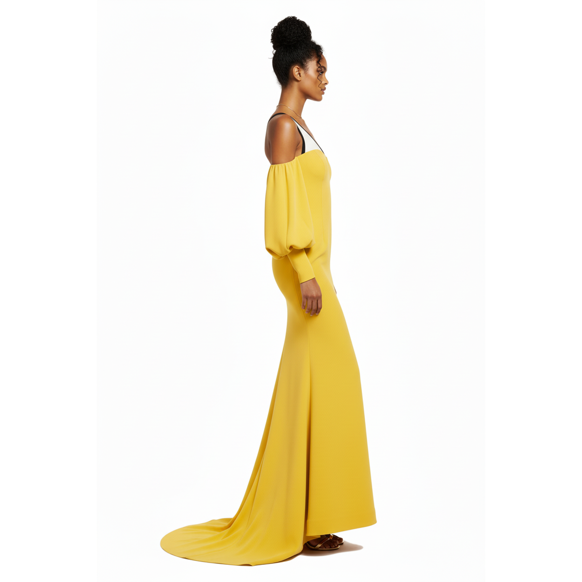 Woman wearing a yellow evening gown on a white background