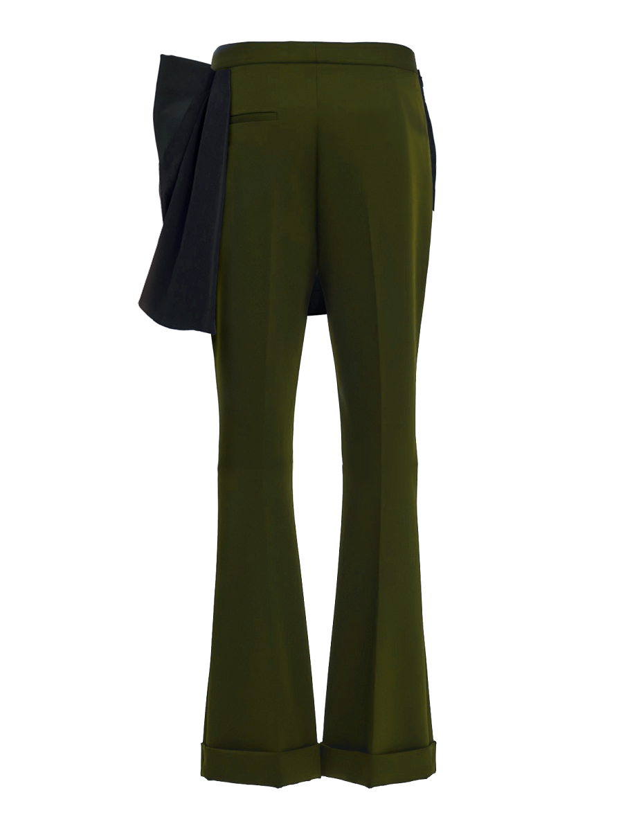 Green pants with a black bow on a white background