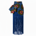 A blue wrap skirt featuring a bold multicolor circular pattern on the waist and a long, flowing fringe skirt in a deep blue shade, shown against a plain white background.