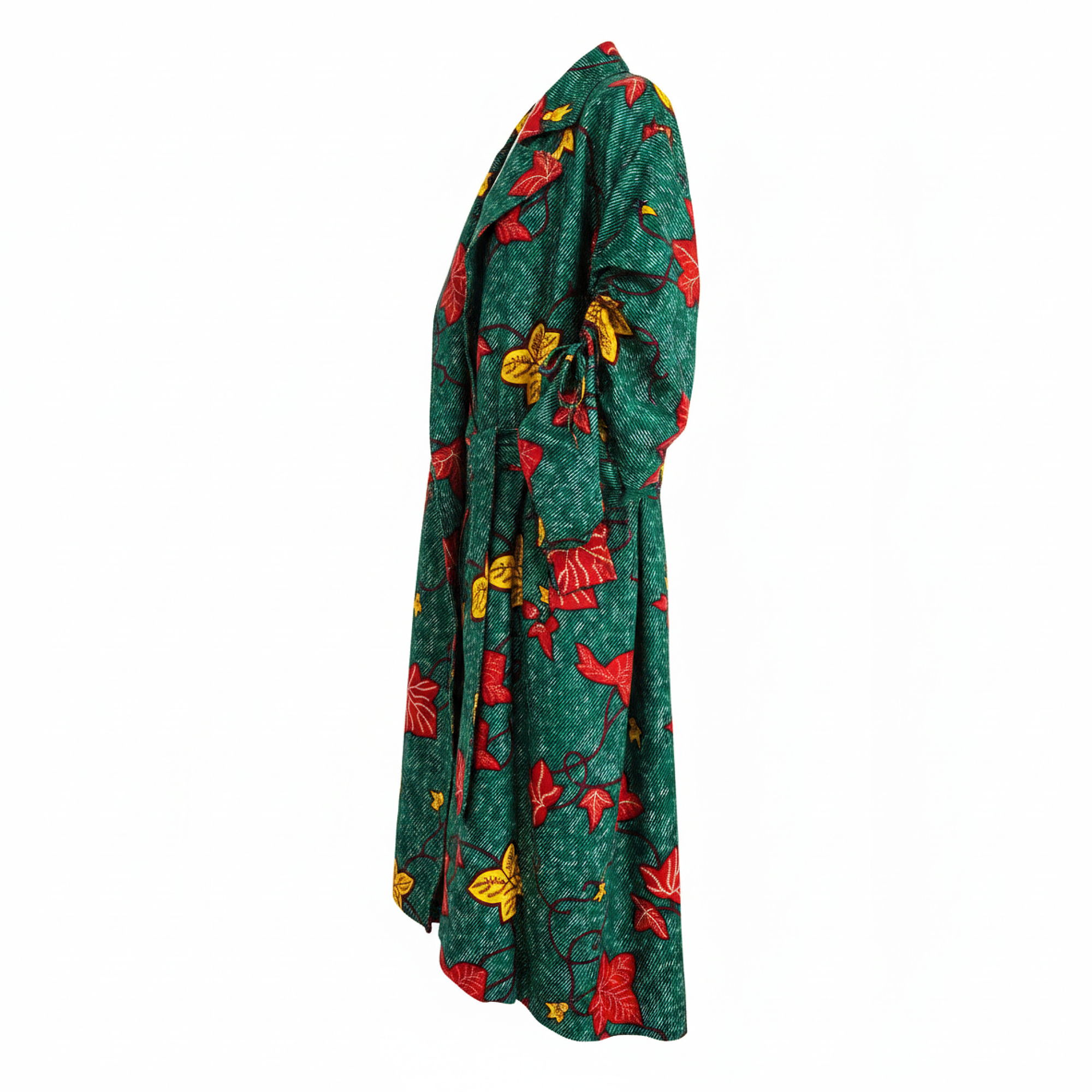 A long-sleeved wrap dress in dark green with a vibrant red and yellow floral pattern, shown from a side profile on a solid white background.