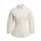 White blouse with intricate detailing on a white background