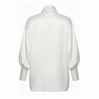White blouse with long sleeves on a white background