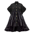 Black dress with gold buttons on a white background