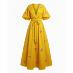 Yellow dress with floral embellishments on a white background